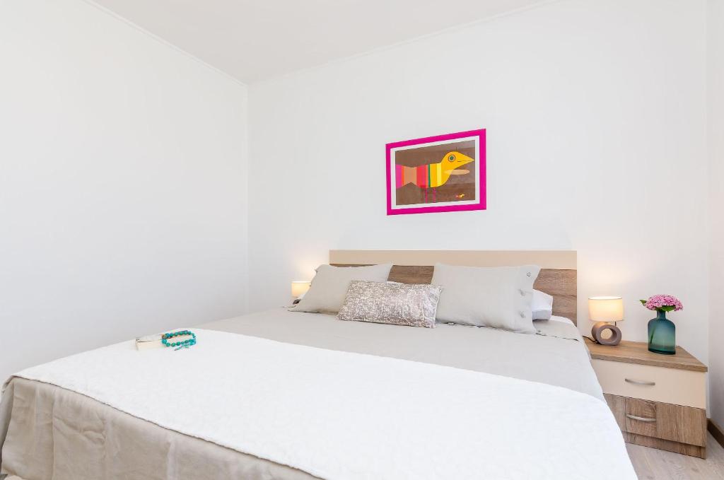 Posteľ alebo postele v izbe v ubytovaní Adriatic Sunny Apartments