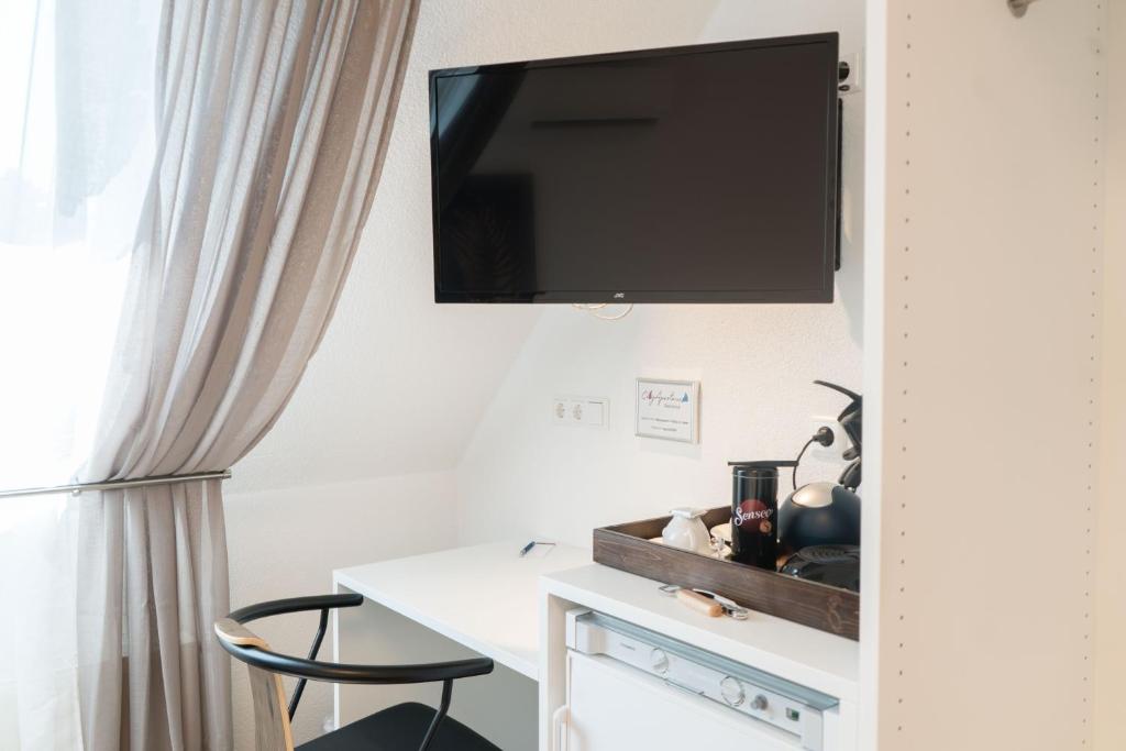 Kuchyň nebo kuchyňský kout v ubytování CityApartments Residence klimatisiert