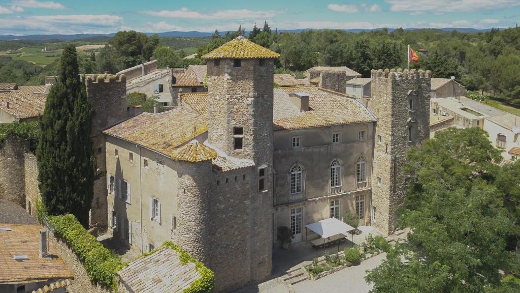 an aerial view of a castle in a town at Château d'Agel gite in Agel