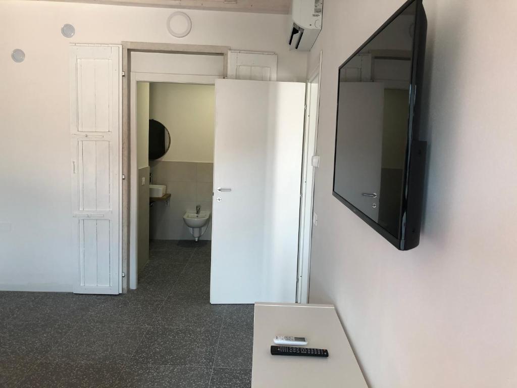 Telewizja i/lub zestaw kina domowego w obiekcie Corte del Garda Home