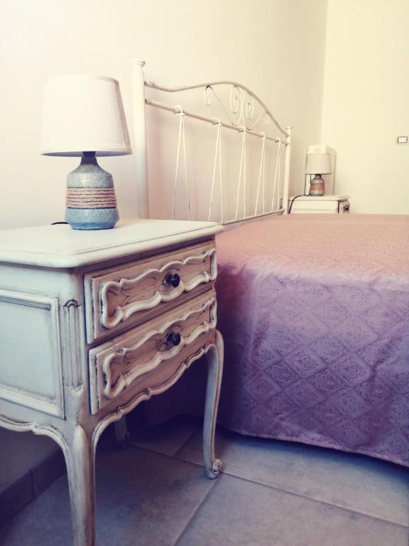 A bed or beds in a room at La Nuova Casetta