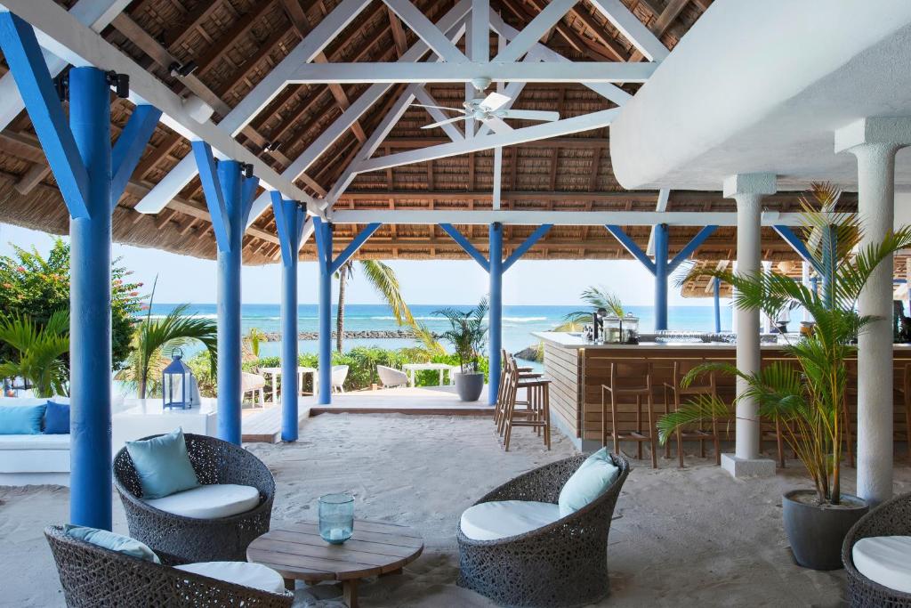 a resort with a view of the ocean at Veranda Pointe Aux Biches Hotel & Spa in Trou aux Biches