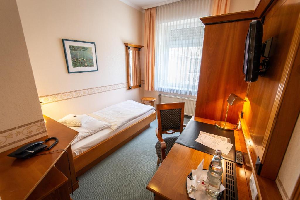 TV a/nebo společenská místnost v ubytování Hotel Krupp