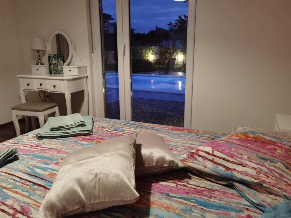 Posteľ alebo postele v izbe v ubytovaní Family house Hana
