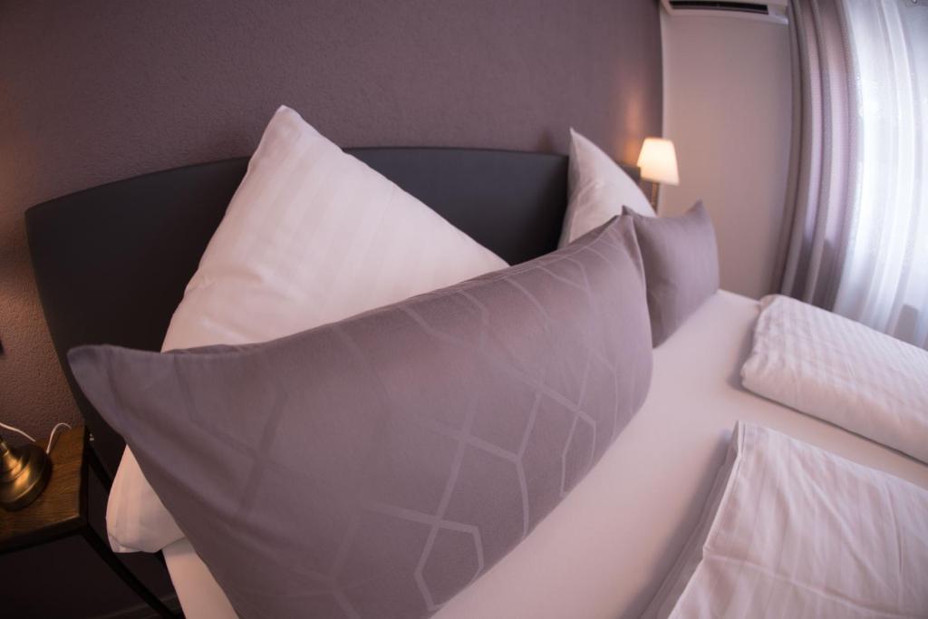 Postel nebo postele na pokoji v ubytování CityApartment K1 KLIMATISIERT