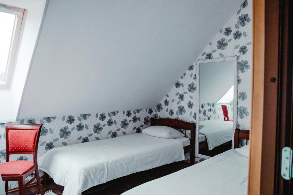 Postel nebo postele na pokoji v ubytování Tindioru Holiday House