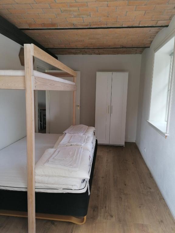 Postel nebo postele na pokoji v ubytování Aagaarden