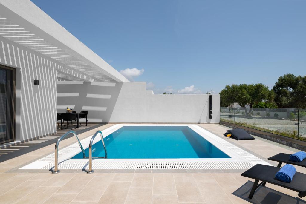 The swimming pool at or close to Armonia Suites