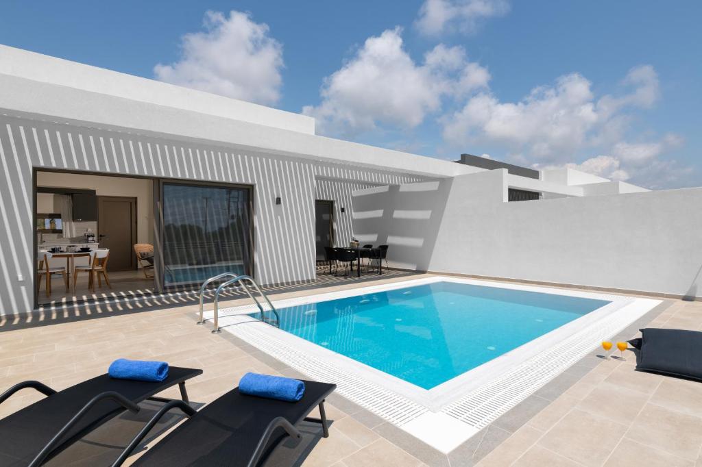 The swimming pool at or close to Armonia Suites