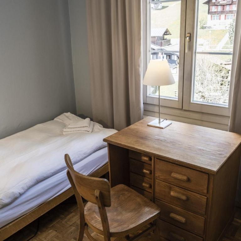 Postel nebo postele na pokoji v ubytování Hotel Regina