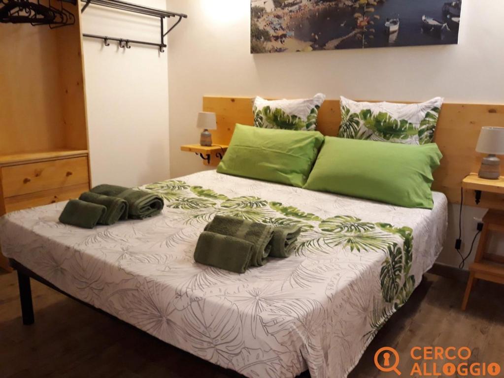 Postel nebo postele na pokoji v ubytování Elim Suite & Rooms