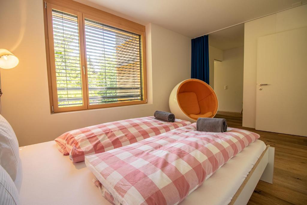 Postel nebo postele na pokoji v ubytování Salis 06 by Arosa Holiday