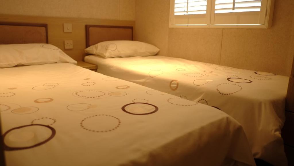 Ein Bett oder Betten in einem Zimmer der Unterkunft The Ashcroft
