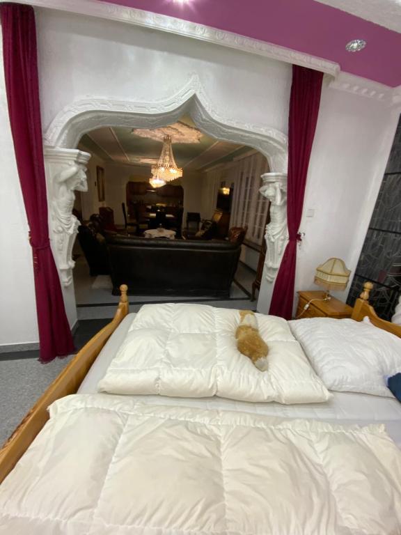 A bed or beds in a room at Villa in Walsrode