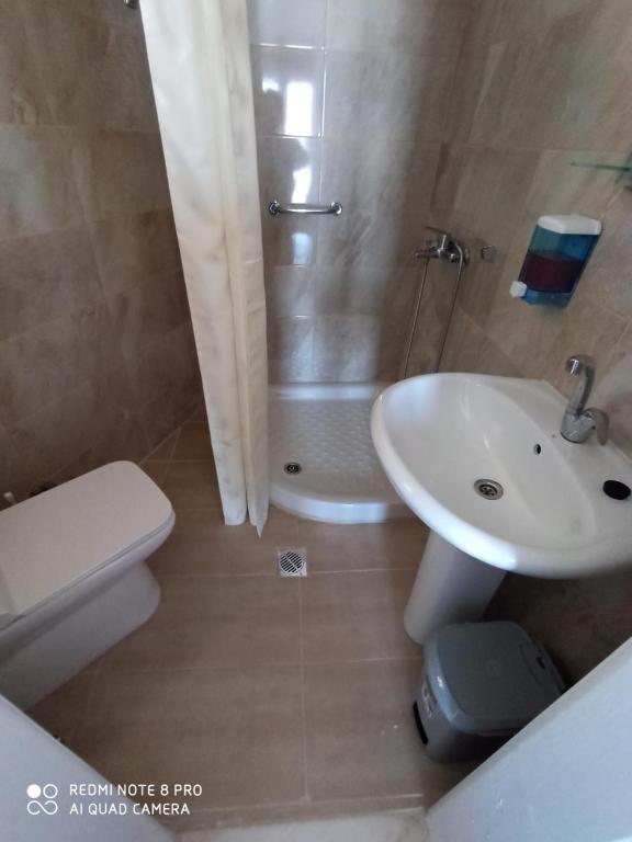 Koupelna v ubytování Hotel Galini