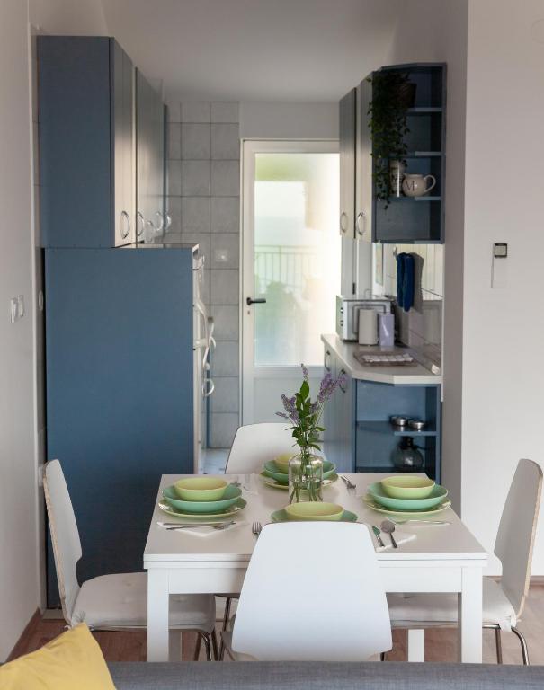 Kuchyň nebo kuchyňský kout v ubytování Apartment Iris