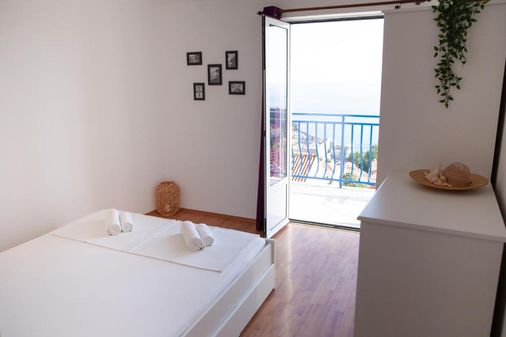 Postel nebo postele na pokoji v ubytování Apartment Iris