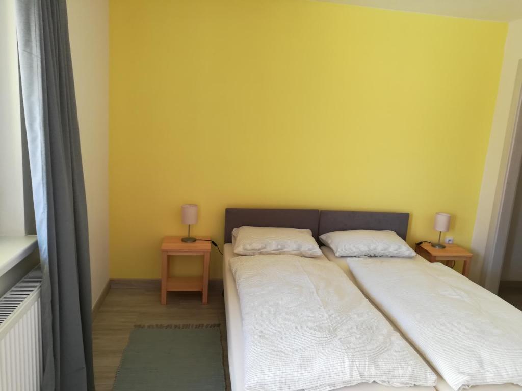 Postel nebo postele na pokoji v ubytování Zlatno 66