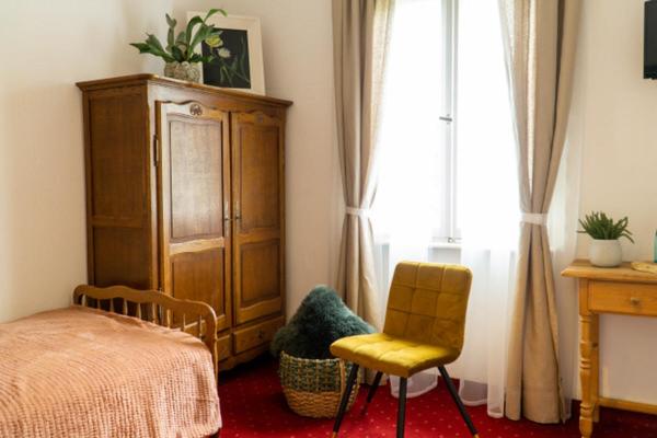 Postel nebo postele na pokoji v ubytování Hotel am Bach