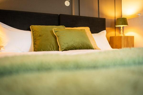 Postel nebo postele na pokoji v ubytování Hotel am Bach