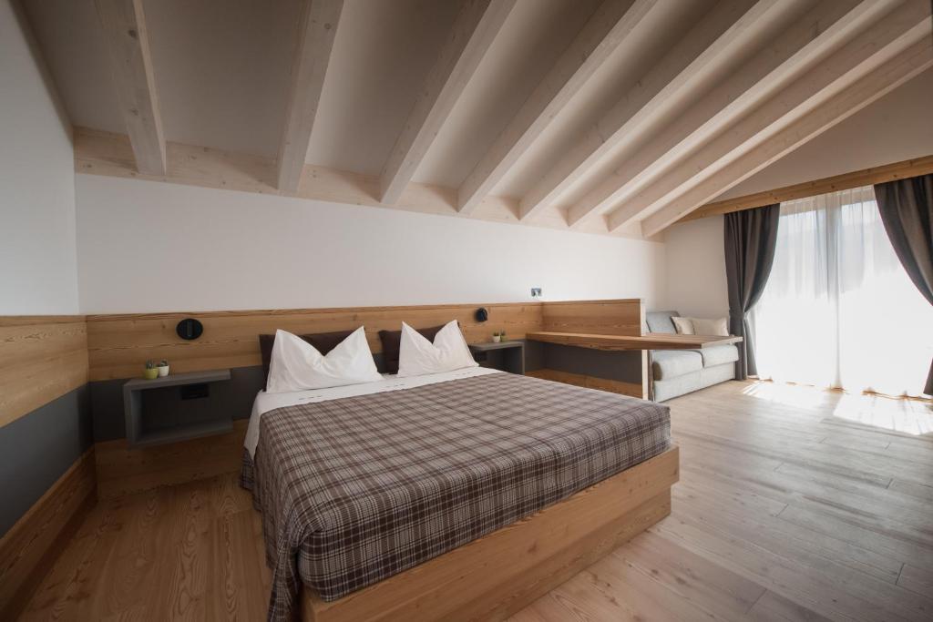 Posteľ alebo postele v izbe v ubytovaní Agritur Renetta