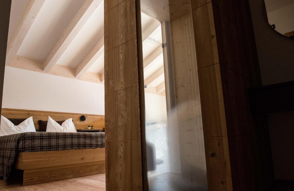 Posteľ alebo postele v izbe v ubytovaní Agritur Renetta