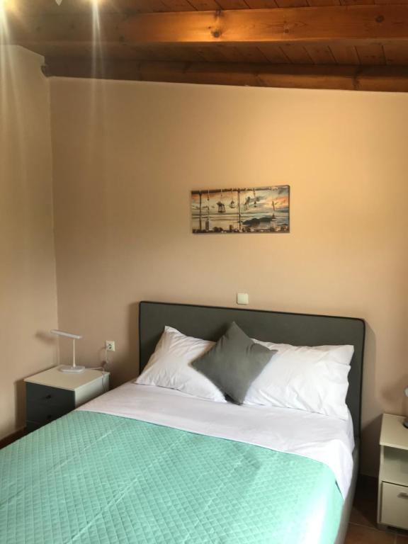 A bed or beds in a room at Country house