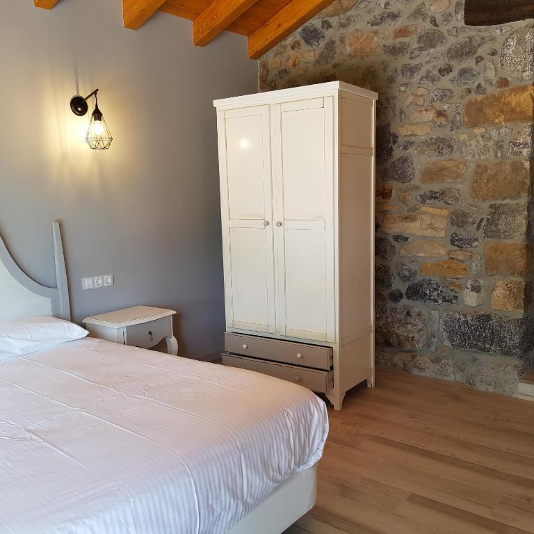 Postel nebo postele na pokoji v ubytování Posada las Albarcas