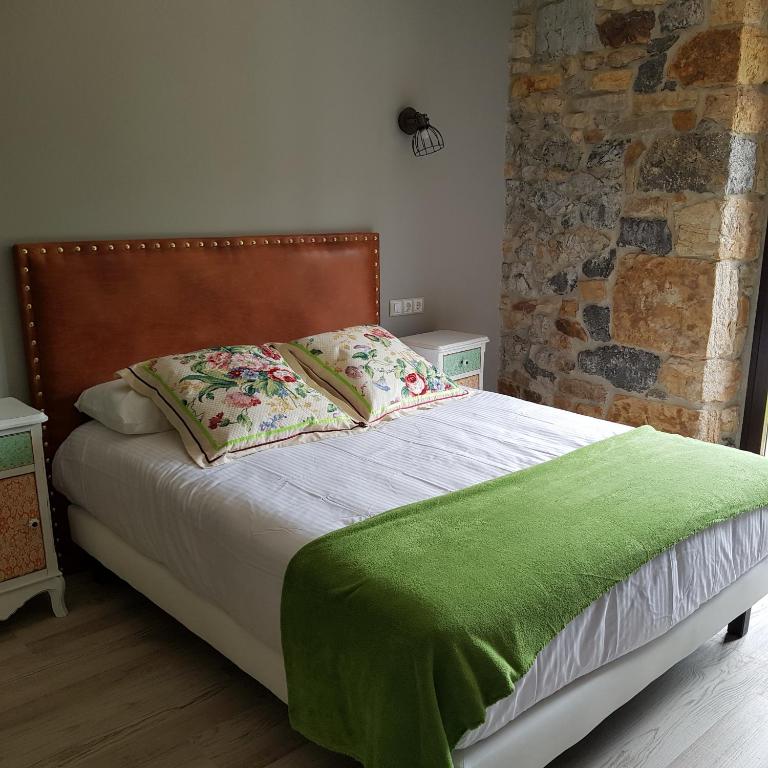 Postel nebo postele na pokoji v ubytování Posada las Albarcas