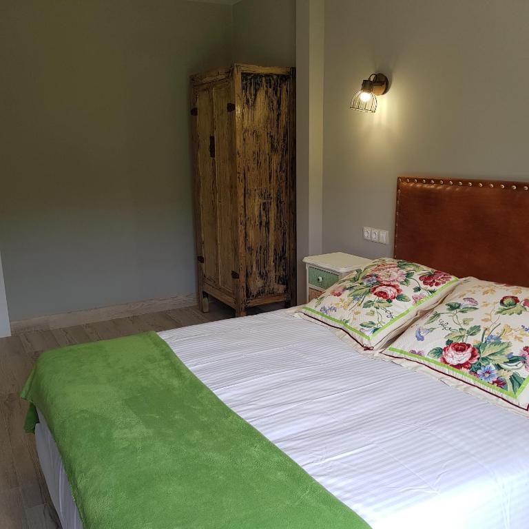 Postel nebo postele na pokoji v ubytování Posada las Albarcas