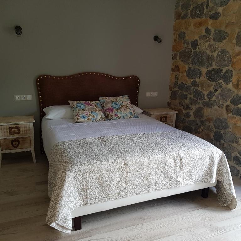 Postel nebo postele na pokoji v ubytování Posada las Albarcas