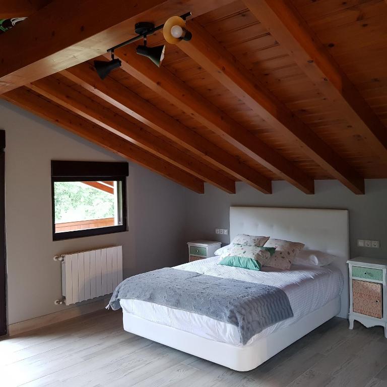 Postel nebo postele na pokoji v ubytování Posada las Albarcas