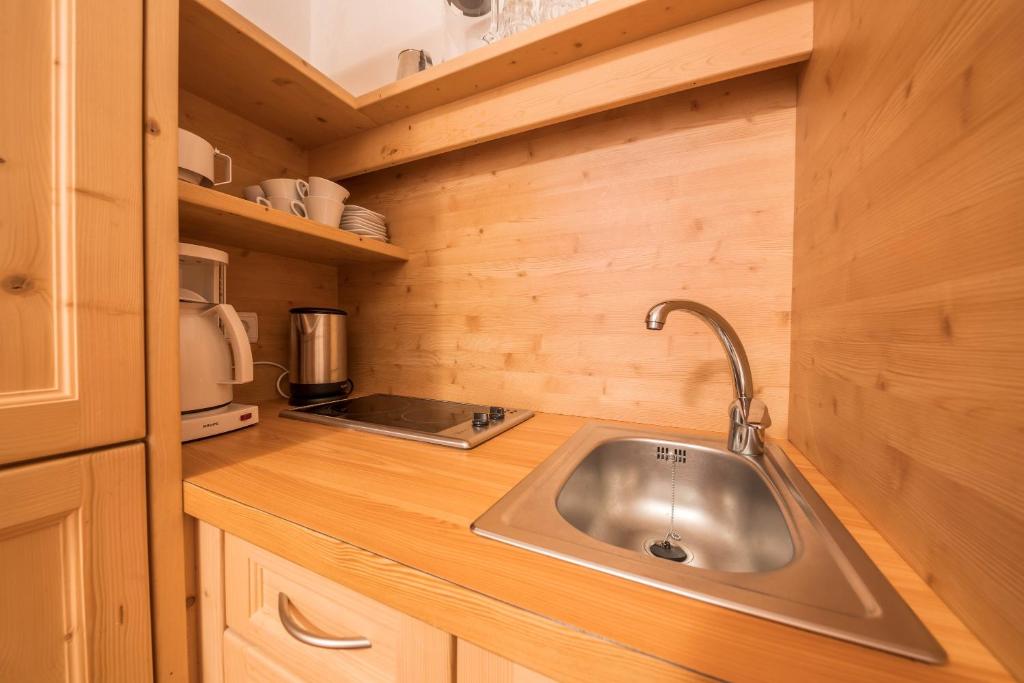 Kuchyň nebo kuchyňský kout v ubytování Ferienwohnung Innerwalten 100
