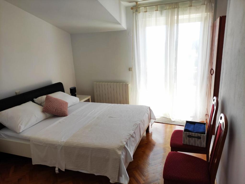 Postel nebo postele na pokoji v ubytování Guesthouse Varnica