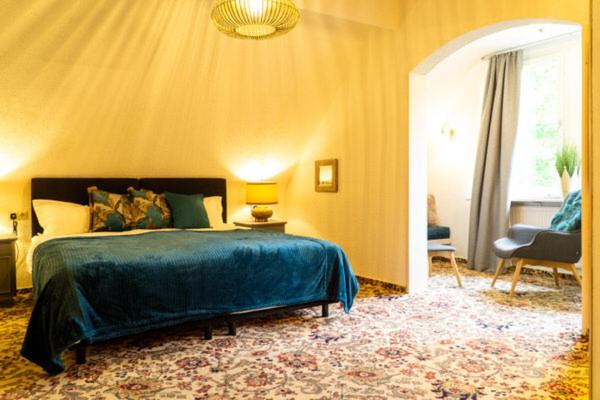 Postel nebo postele na pokoji v ubytování Hotel am Bach