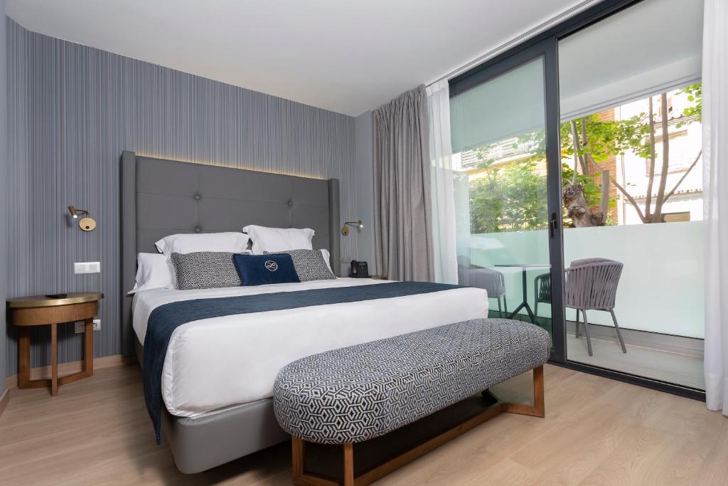 Posteľ alebo postele v izbe v ubytovaní Hotel Lima - Adults Recommended