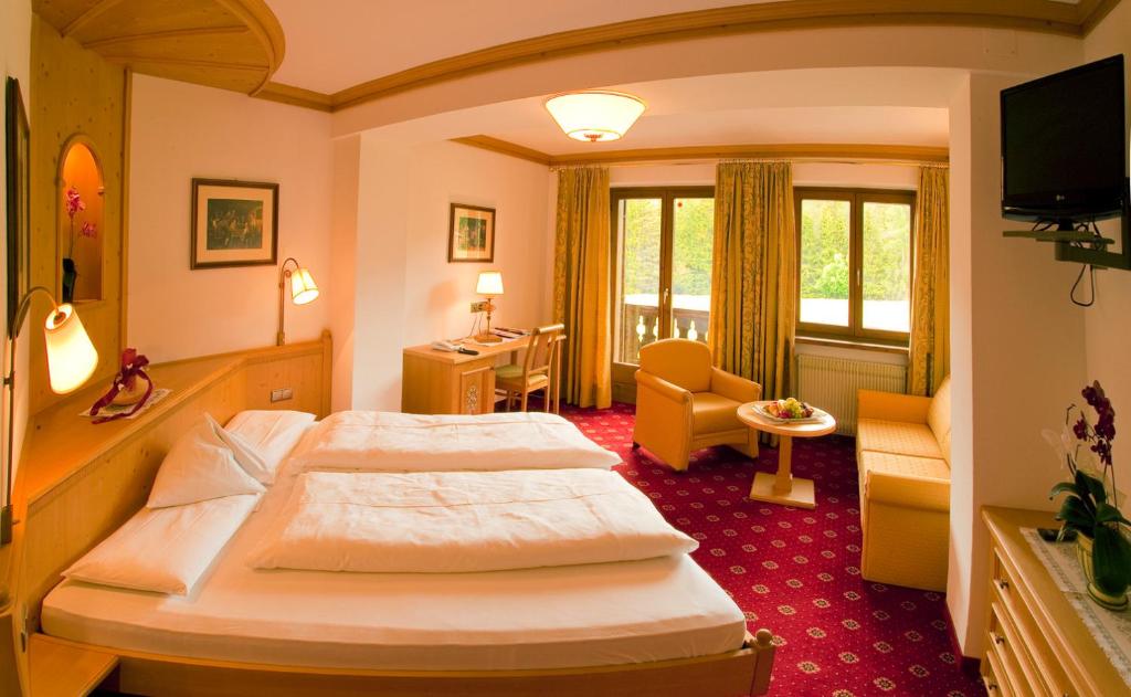 Postel nebo postele na pokoji v ubytování Hotel Hubertushof