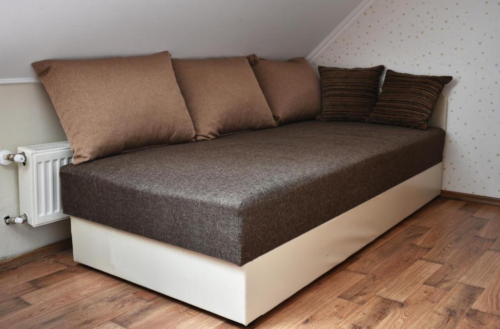 Posteľ alebo postele v izbe v ubytovaní Lagom Apartman