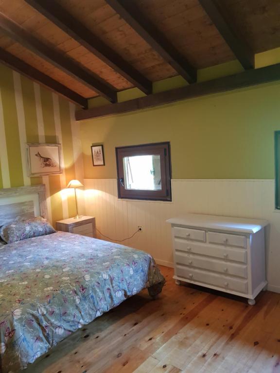 Posteľ alebo postele v izbe v ubytovaní CASA DE CAMPO LAS ROZAS