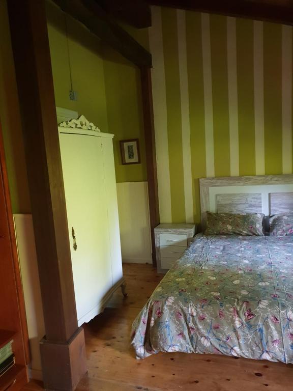 Posteľ alebo postele v izbe v ubytovaní CASA DE CAMPO LAS ROZAS