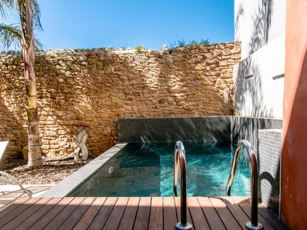 Πισίνα στο ή κοντά στο Holiday Home Sa Muralla by Interhome