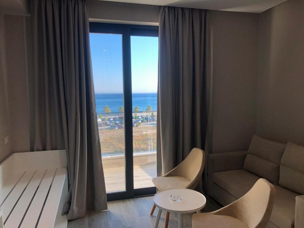Posezení v ubytování Hotel Qeparo