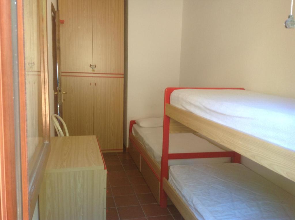 Poschodová posteľ alebo postele v izbe v ubytovaní Casa delle lantane climatizzata