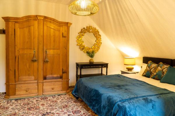 Postel nebo postele na pokoji v ubytování Hotel am Bach
