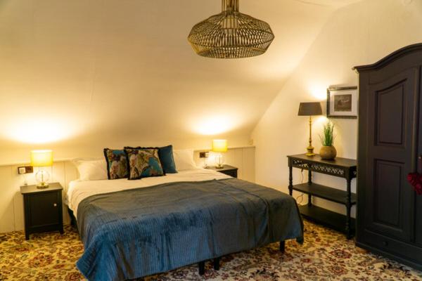Postel nebo postele na pokoji v ubytování Hotel am Bach