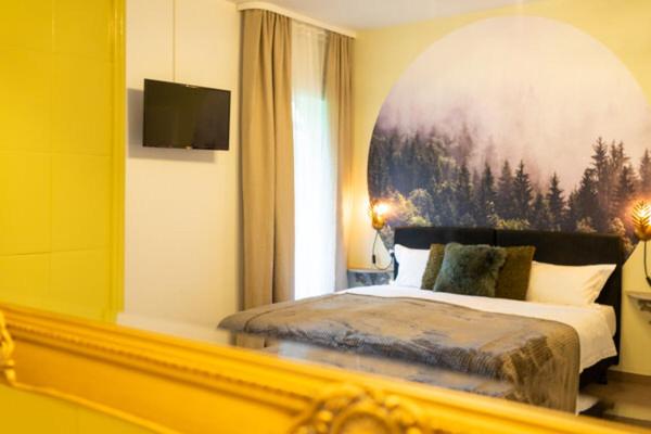 Postel nebo postele na pokoji v ubytování Hotel am Bach