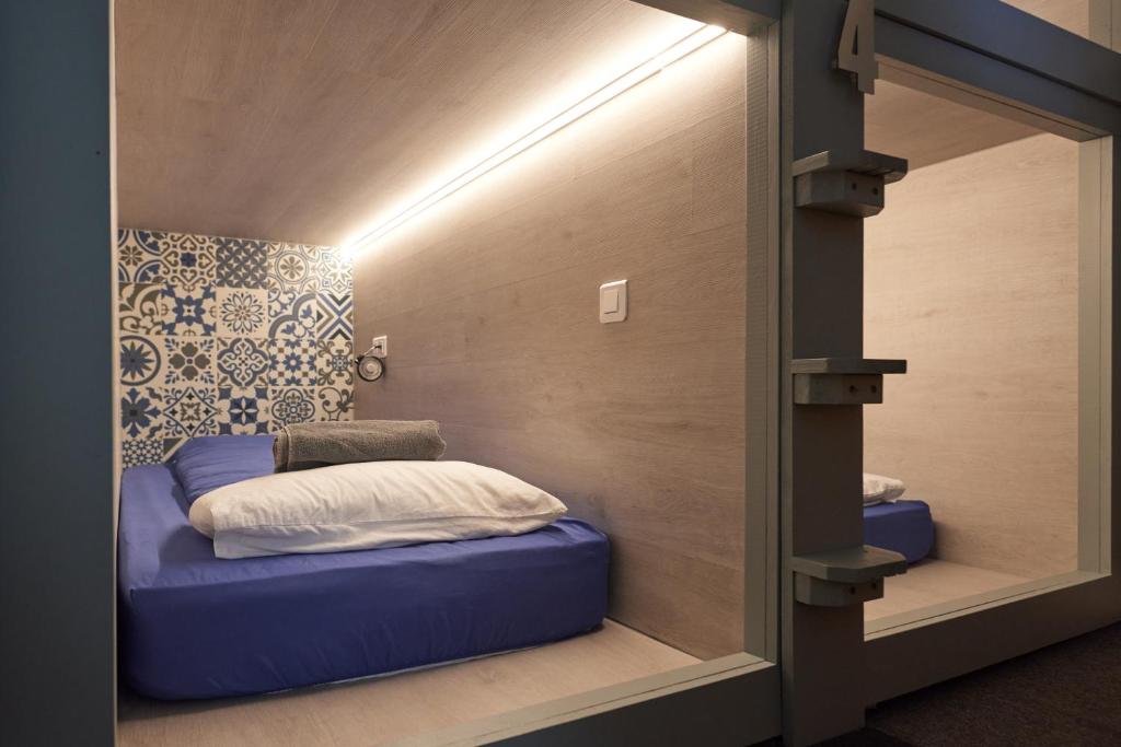 Postel nebo postele na pokoji v ubytování Vert Lodge Chamonix