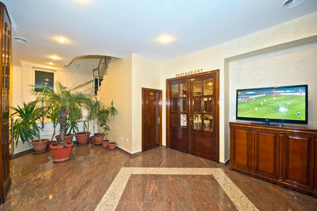 TV a/nebo společenská místnost v ubytování Hotel Bavaria