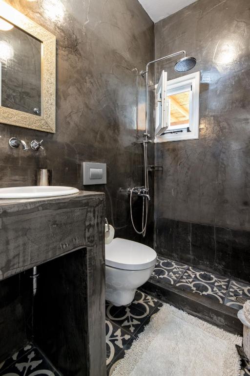 A bathroom at Daphne's Lux Villa