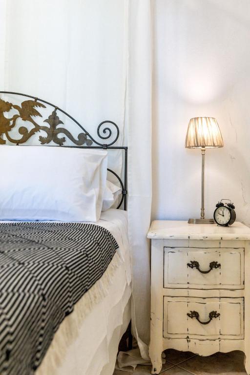 A bed or beds in a room at Daphne's Lux Villa